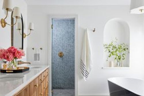 modern bathroom with blue tile shower