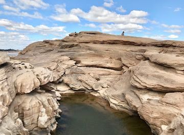 Hat Chom Dao- Dramatic rock formations created by Mekong River
