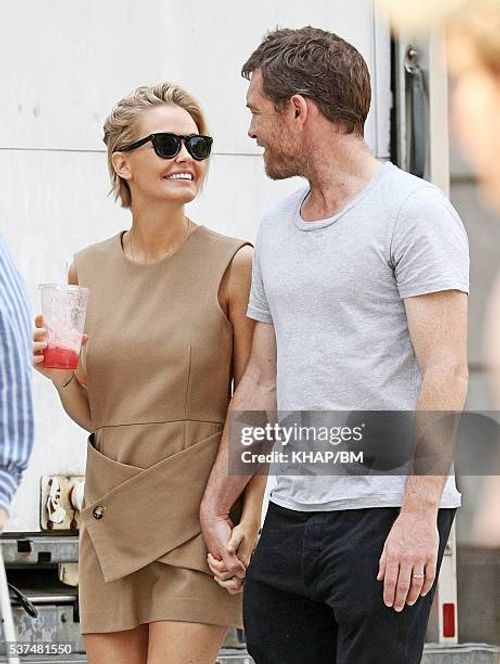 Lara Bingle and actor husband Sam Worthington pictured sight seeing uptown on May 26, 2016 in New York, USA.