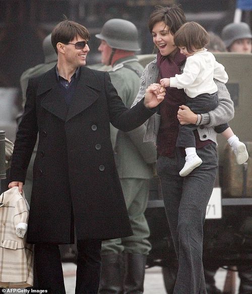 Tom Cruise, Katie Holmes and their daughter Suri visit the set of a film in Berlin in September 2007