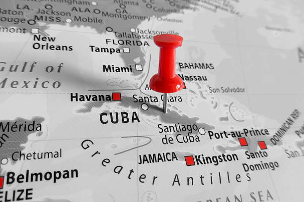 Red marker over Cuba island Red marker over Cuba island cuba map stock pictures, royalty-free photos & images
