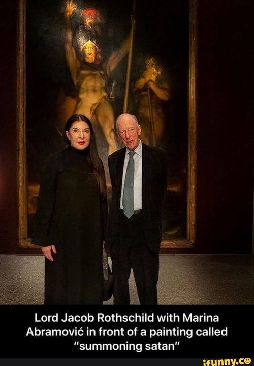 Lord Jacob Rothschild with Marina Abramovic in front of a painting called "summoning satan" - Lord Jacob Rothschild with Marina Abramović in front of a painting called “summoning satan”