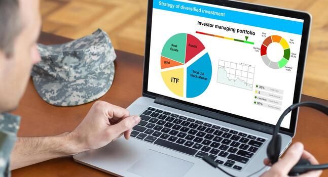 Strategy of diversified investment. Investor managing portfolio. Pie chart and candlestick charts. photo