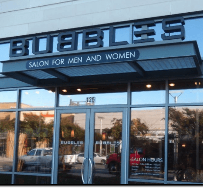 Bubbles Salon entrance with glass doors.