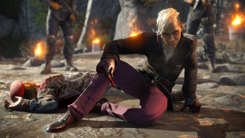 A character kneels over a fallen enemy in a fiery outdoor combat scene. — Far Cry 6 Wallpaper