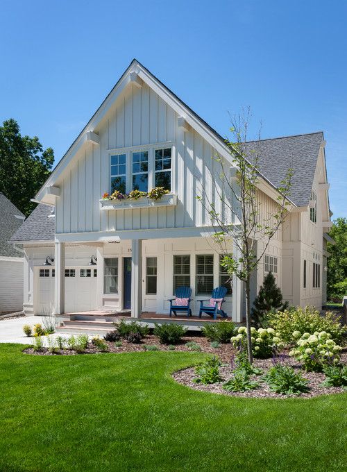 White Farmhouse with Board-and-Batten Siding