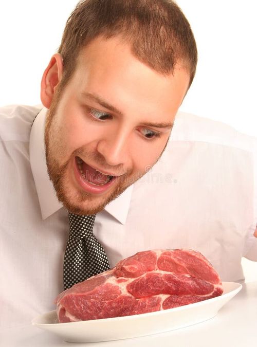 Eccentric guy eating red meat