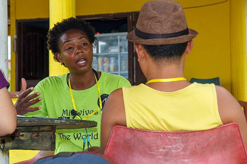 September 18th: The Midwife Alama Sylla is interviewing the Funder, Matius Wau of the Love one Niha Pelita Kasih Foundation outside of the Lagundri...