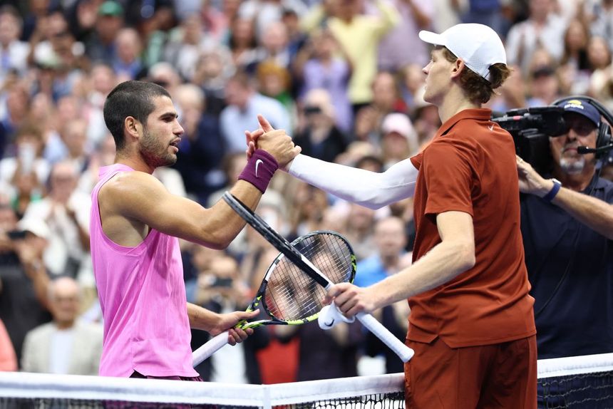 Thrilling tennis match at the US Open with a full stadium of enthusiastic fans.