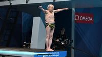 100-year-old performs exhibition dive at the 2024 Doha World Championships ahead of World Aquatics Masters Championships | CNN