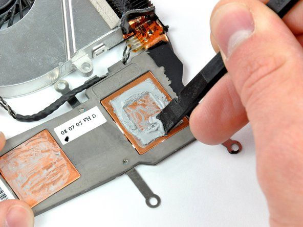 How to Repaste a Laptop, Clean off the old thermal paste from the heat sink: step 9, image 1 of 2
