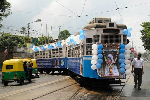 The tram decorated with Saint Mother Teresa’s pictures, posters, texts to mark canonization of Mother Teresa in front of Mother House, on September...