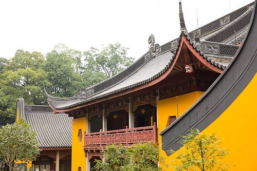 Monks performing rituals inside Lingyin Temple