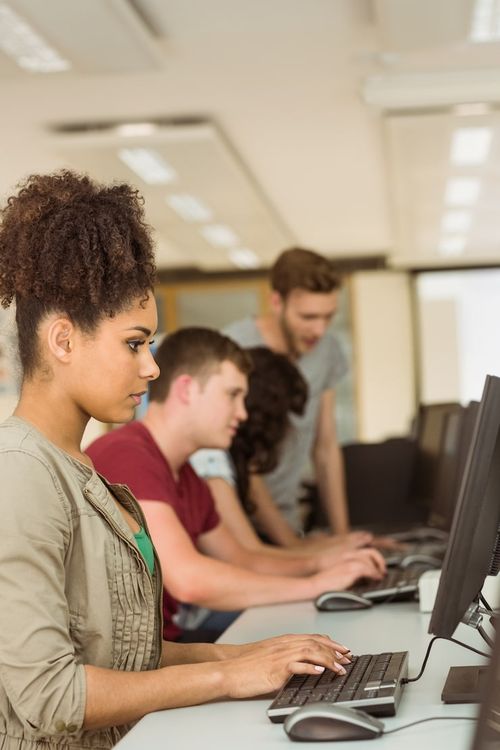 Photo classmates working in the computer room