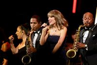 Taylor Swift Fires Up Academy Gala With Four Songs in Her First Band Performance Since the Eras Tour - Variety