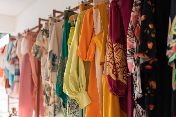 A designer sketching a garment concept by hand