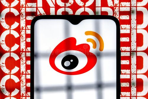 Kazan, Russia - Mar 10, 2022: Weibo chinese microblogging service logo on smartphone screen behind bars on background with inscription censored. The concept of Weibo censorship. Weibo app stock images, royalty-free photos and pictures