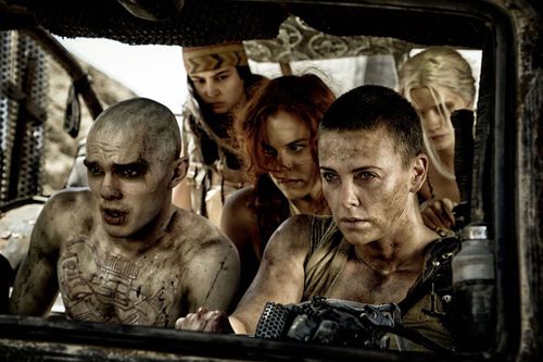 Nicolas Hoult, Riley Keough and Charlize Theron as Imperator Furiosa in "Mad Max: Fury Road" (2015)