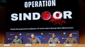 arafed image of a panel of military personnel sitting at a table