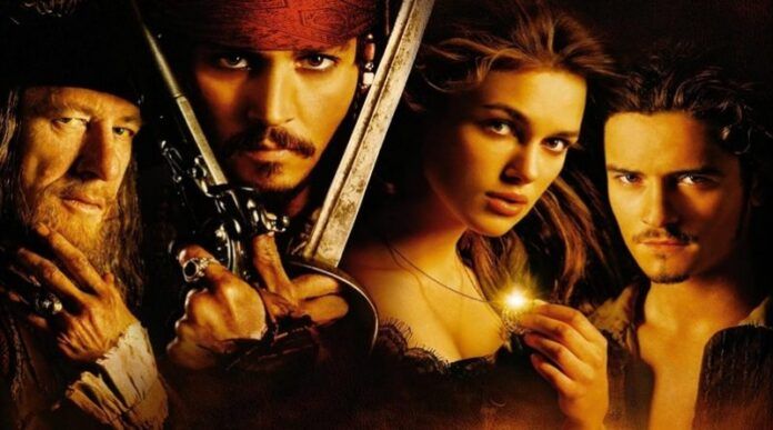 Elenco principal de Piratas do Caribe A Maldição do Pérola Negra com Johnny Depp Geoffrey Rush Orlando Bloom e Keira Knightley