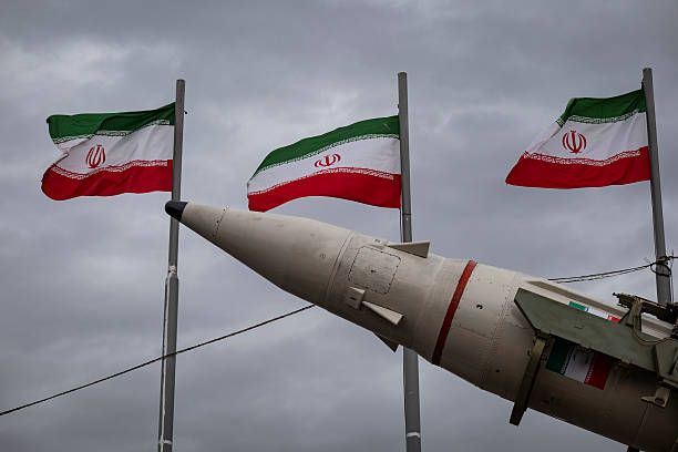 An Iran-made ballistic missile is displayed during a rally commemorating the 47th anniversary of the Islamic Revolution's victory in Azadi Square in...