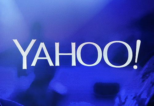 Yahoo! logo is shown on a screen during a keynote address by Yahoo! President and CEO Marissa Mayer at the 2014 International CES at The Las Vegas...