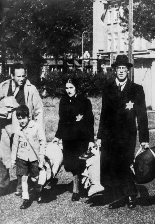 Jewish family leaves their home, Holland, World War II.