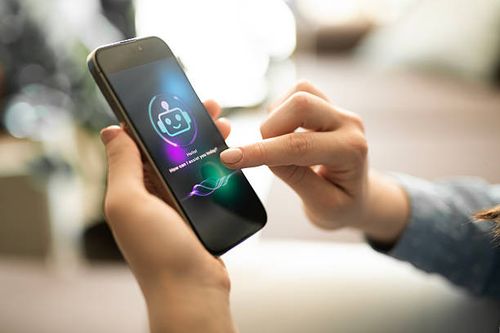 woman using ai chatbot. - chat bot stock pictures, royalty-free photos & images