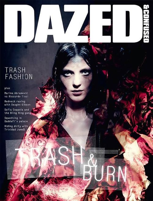 the cover of dazed magazine featuring a woman with long hair and red leaves on her shoulders