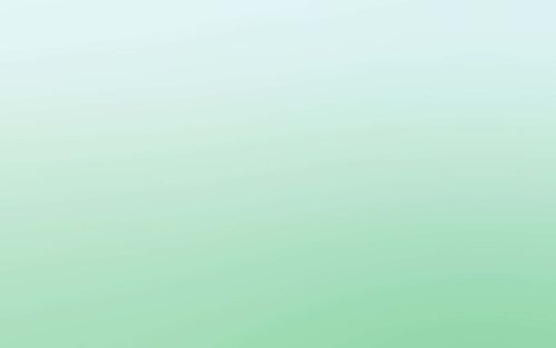 A calming and tranquil pastel green background.
