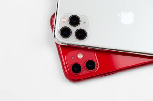 Apple iPhone 11 Red color and Apple iPhone 11 Pro silver color on a white background Rostov-on-Don, Russia - November 2019. Apple iPhone 11 Red color and Apple iPhone 11 Pro silver color on a white background. New smartphones from the company Apple close-up. red-iphone-11 stock pictures, royalty-free photos & images