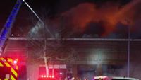Omaha firefighters battle large building blaze near Midtown