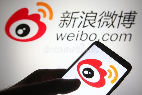 KYIV, UKRAINE - JULY 06, 2021: In this photo illustration Sina Weibo logo of a Chinese microblogging weibo website is seen on a mobile phone in a hand. Weibo app stock images, royalty-free photos and pictures