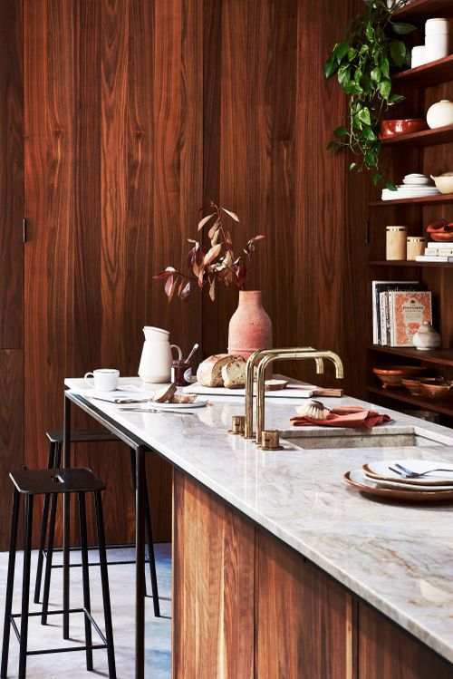 kitchen dark wood walnut panel walls and marble effect kitchen breakfast island, top shelf ceramic storage jars, £35two, cox  cox second shelf elliot baking dish, £30, habitat pedra pampas vase, £1895, urban nature culture third shelf salt oval plates, £6970four, broste copenhagenandalucia serving bowl with lid, £18, habitat fourth shelf ring sandstone canisters, from£5950 each, broste copenhagen moroccan serving bowl, £58, eesome linen napkin in orangerust, £10, heal’s fifth and botto