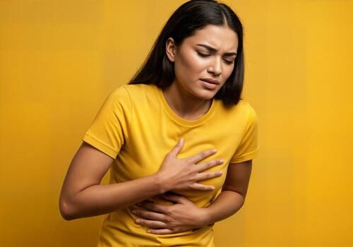 A woman with a stomachache photo