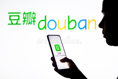 March 28, 2022, Brazil. In this photo illustration, a woman`s silhouette holds a smartphone with the Douban logo displayed on the screen and in the background. Douban stock images, royalty-free photos and pictures
