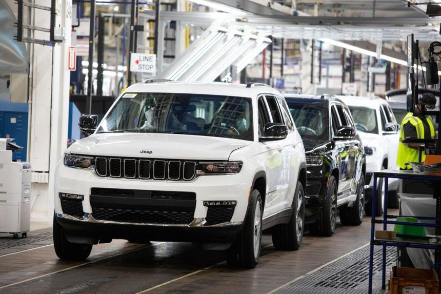 Jeep SUV undergoing quality inspection during the certified pre-owned vehicle evaluation process