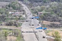 Desperate civilians risk their lives along mined roads to escape from a Russian-held city - AP News