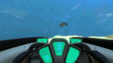 a video game shows a turtle swimming in the water
