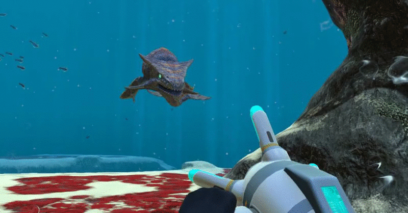 Animated gif from the video game Subnautica: first-person view exploring underwater with a handheld propulsion device as a large sea creature glides past a red-and-white seabed.