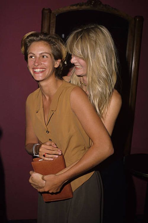 Julia Roberts and Laura Dern during "Young Guns II" Hollywood Premiere at Mann's Chinese Theater in Hollywood, California, United States.