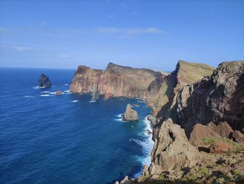 Sunrise over the eastern coastal cliffs at Ponta do Rosto