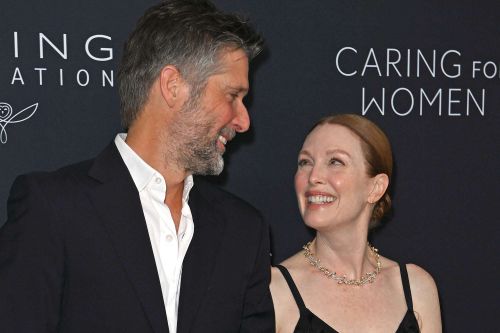 US actress Julianne Moore and husband US director Bart Freundlich attend the 2024 Kering Foundation's Caring for Women dinner at The Pool in New York City on September 9, 2024