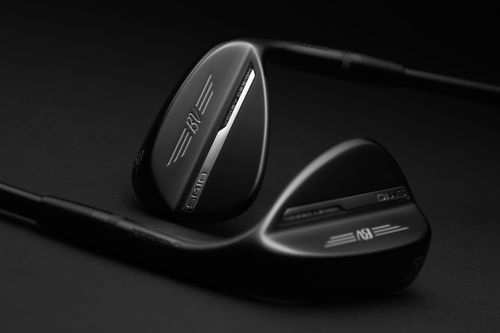 Low Bounce K Grind wedge with a raw finish, featuring a wide, cambered sole for a smooth appearance.