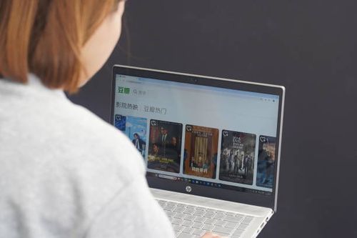 In this photo illustration, A woman browses Douban website on her laptop.