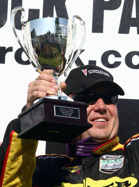 Leighton Reese raises his trophy after winning the Rolex Series GT Challenge at Lime Rock Park May 28, 2007 in Lakeville, Connecticut.