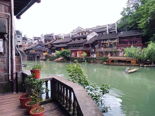 Traditional stilted houses overlooking the river in Fenghuang