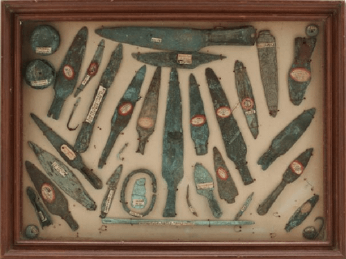 r/AlternativeHistory - Figure 10. A framed selection of copper tools from various Native American cultures, but most of these are from the Old Copper Culture.