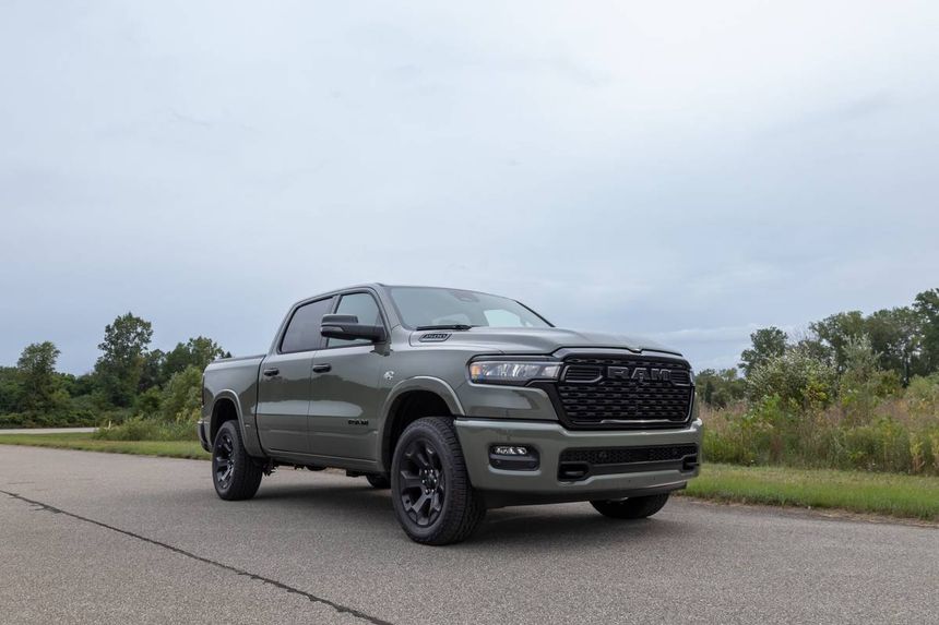 Gray Ram 1500 pickup truck parked on open road showcasing bold exterior design in Southern California