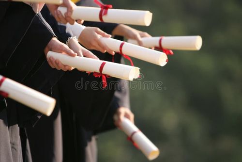 Graduation students holding there certificate. Bachelors degree stock images, royalty-free photos and pictures